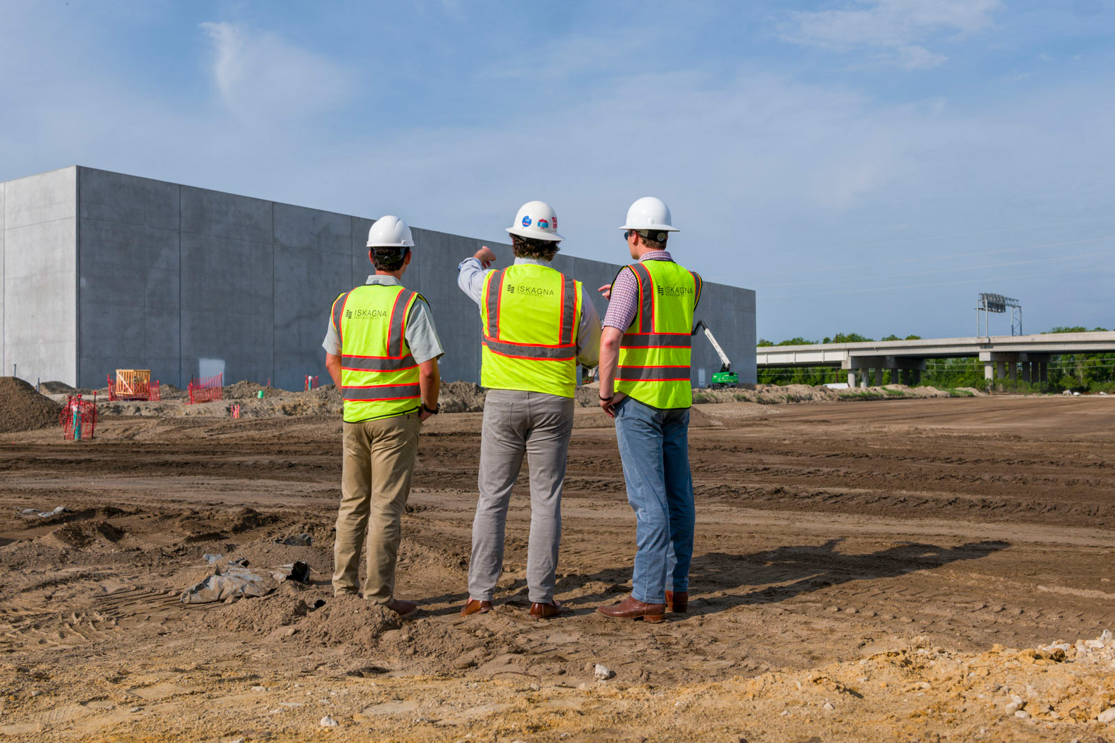 Team of three overseeing development of project