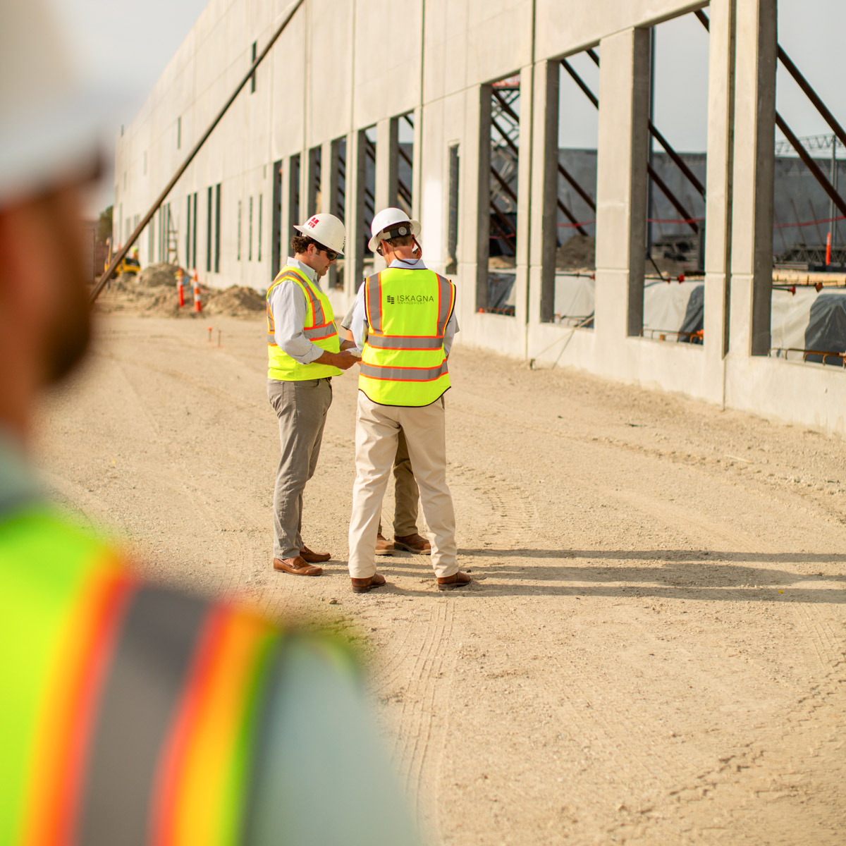 Team of three overseeing development of project